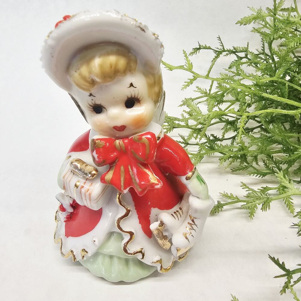 Vintage TMJ Christmas Angel Bell Figurine Holding Gift Skates 1950